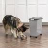 imageIRIS USA Dog Food Storage Container with Wheels Airtight Lid 2Cup Scoop Up to 54 Pounds Pet Food Storage Built in Scoop Storage in Lid Versatile Pet Food Bin Portable BPA Free GrayDark GrayGrayDark Gray