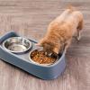 imageIRIS USA Elevated Dog Bowls Adjustable Height 2 Thick 64 oz Stainless Steel Bowls SpillProof with Raised Outer Rim Durable Made in USA Plastic Easy Assemble 2 Heights 463quot or 1225quot BlackGray