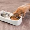 imageIRIS USA Elevated Dog Bowls Adjustable Height 2 Thick 64 oz Stainless Steel Bowls SpillProof with Raised Outer Rim Durable Made in USA Plastic Easy Assemble 2 Heights 463quot or 1225quot BlackAlmond