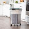 imageRemington WeatherPro Airtight Dog Food Storage Container Up to 22 lbs Attachable Wheels For Dog Cat Bird and Other Pet Food Storage Bin Keep Fresh Translucent Body Green42 lbs