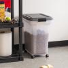 imageIRIS USA Airtight Dog Food Storage Container WeatherPro Up to 40 lbs Removable Wheels for Dog Cat Bird and Other Pet Food Storage Bin Keep Fresh Translucent Body Made in USA SmokeBlackClearDark Gray