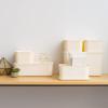 imageIRIS USA 7 Qt Plastic Basket Storage Bins with Lids Small 4Pack Stackable Lidded Storage Organizer Bins for Kitchen Bathroom and Bedroom PearlOff White